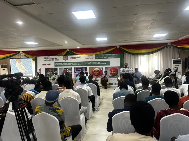 The audience and stage at the community programme