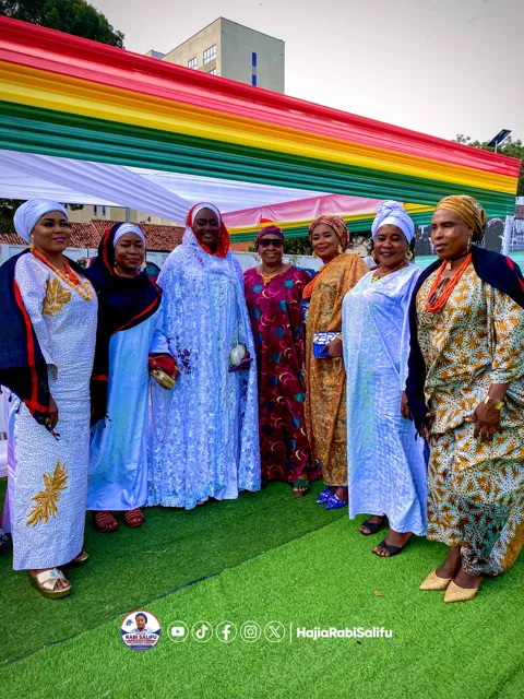A group photograph at the outdoor event